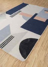 Tapis multicolore en laine et