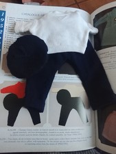 ancien vêtements de poupée