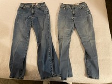 (2) pre-owned Levi’s 512 Boot Cut 10PM blue jeans