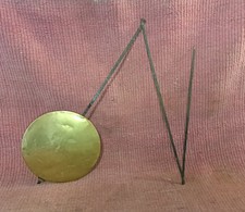 Ancien balancier d'horloge