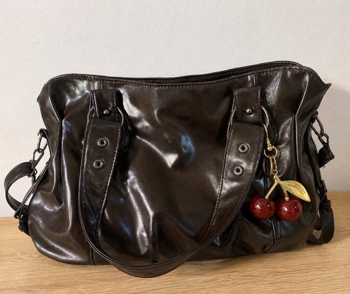 Sac main marron - à,