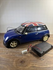 This is a 1/12th scale Mini Cooper r/c car Dickie Spielzug For Repair No Remote