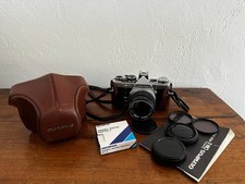 Superbe appareil photo argentique Olympus OM-2 + G-Zuiko 50mm 1,4