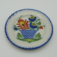 Auvillar. Earthenware plate with polychrome decoration of a flowery basket, 19th century