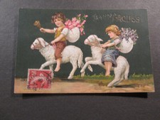 Fancy postcard - happy Easter - children on lambs