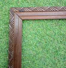 ANCIEN CADRE EN BOIS SCULPTE