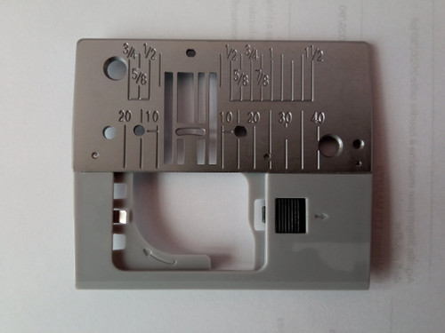 Plaque aiguille pour machine