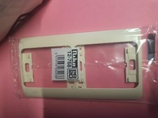 Niko 12-768 - Plaque Double NIKO Horizontale CREME entraxe 71mm Enjoliveur NIKO