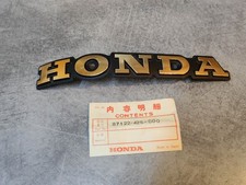 Emblème de réservoir coté