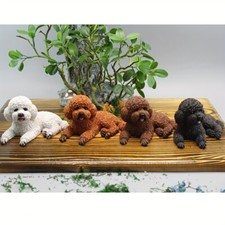 Figurines de chien caniche en