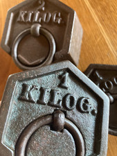 Lot de 3  poids en fonte de