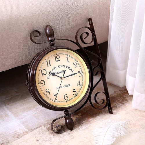 Horloge double face - , forgée