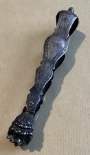 Pince à sucre argent massif .