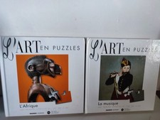 LOT 2 PUZZLE BOOK - L ART EN PUZZLE - L AFRICA + MUSIC - COMPLETE NICE CONDITION
