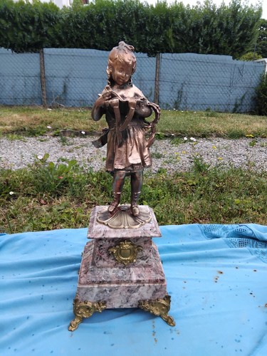 Ancienne statue bronze qui - en,