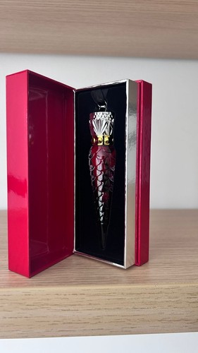 Christian louboutin huile a - christian,