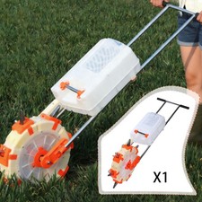 Semoir manuel à pousser pour