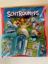 PANINI ALBUM LES SCHTROUMPFS MONDE MAGIQUE + 50 POCHETTES NEUF SOUS BLISTER🍄