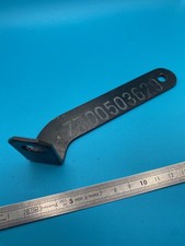 Patte fixation échappement