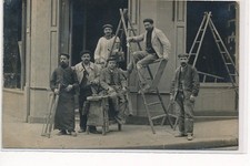 PHOTO CARD TO LOCATE: paris(?) carpenter installing the front of a magician