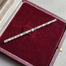 Broche barrette en or 18K et