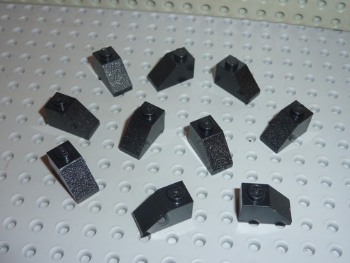 Lego black slope brick - x,
