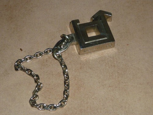Ancien porte clef publicitaire - porte,