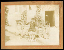 old photo. antique craft. Wheel . spinning . circa 1890 / 1900