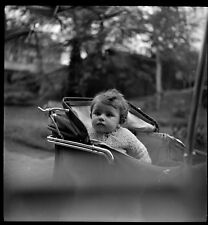 Little girl child in pram stroller - Old negative photo year. 1940