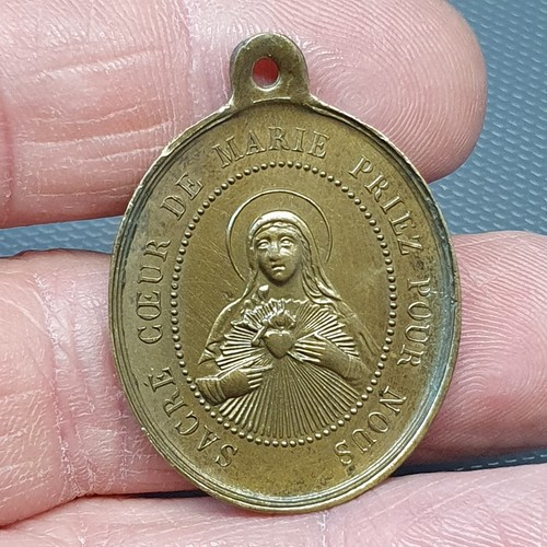 Très ancienne médaille