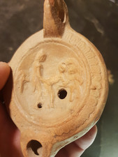 Terracotta oil lamp - figurative decor - 11 x 5 cm