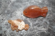 lot of 2 fish figures in orange and onyx calcite stone, minerals
