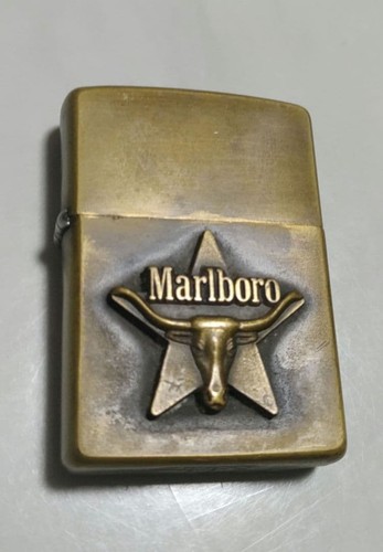 Briquet huile marlboro - à,