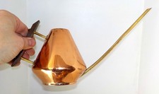 Petit arrosoir en cuivre et