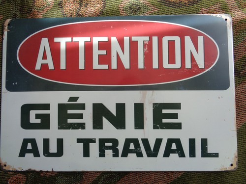 Tole metal attention genie - attention,