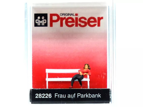 Preiser femme assise sur - assise, un