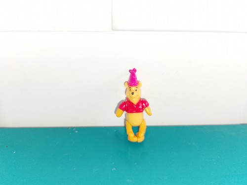 Polly pocket figurine doll