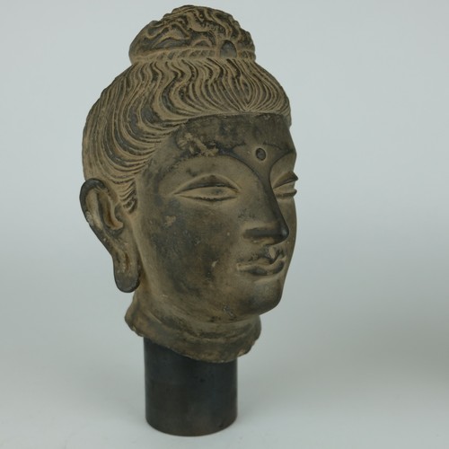 Tête bouddha pierre de - en,
