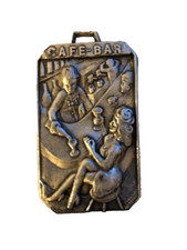 Plaque publicitaire argentée