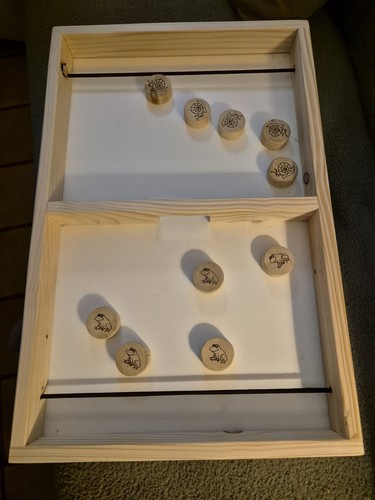 Jeu bois passe trappe - passe,