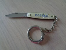 PORTE CLE METAL ET NACRE COGNAC BRIAND