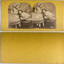 Child sleeping in an armchair, vintage albumen print, ca.1880, stereo print v