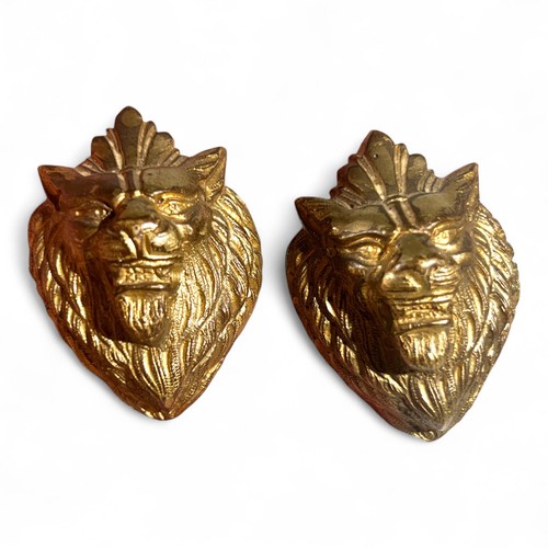 Têtes lion bronze - en,