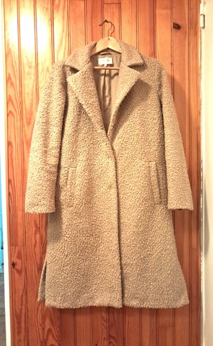 Manteau fausse fourrure sud - en,