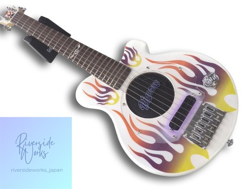 Mini guitare électrique
