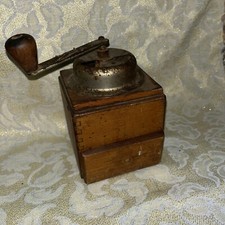 Very old wooden coffee mill with drawer