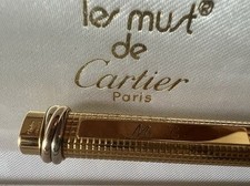 CARTIER Stylo À Bille Trinity Godron Plaqué Or Initiales MC Avec Étui