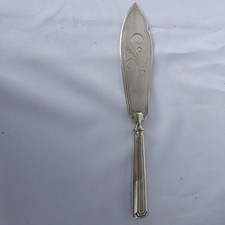 chiseled silver metal pie shovel knife