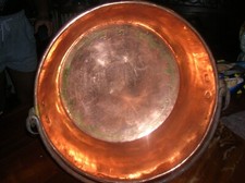 an antique copper cauldron