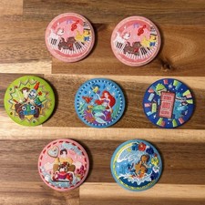 Lot de 7 badges en étain